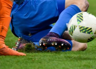 SPFL gambling harm talks equip 94% of players to tackle risks LUBIN, POLAND - DECEMBER 19, 2016: Match Polish Premier League Lotto Ekstraklasa between KGHM Zaglebie Lubin - Piast Gliwice 2:1. Player's legs.
