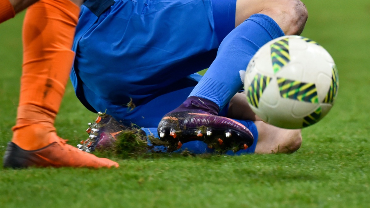 LUBIN, POLAND - DECEMBER 19, 2016: Match Polish Premier League Lotto Ekstraklasa between KGHM Zaglebie Lubin - Piast Gliwice 2:1. Player's legs.