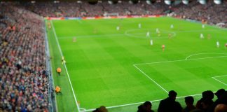 FDC and Stats Perform to redefine storytelling in UK football Blurred background of football players playing and soccer fans in match day on beautiful green field with sport light at the stadium. Sports,Athlete,People Concept.Anfield,Mercyside,Liverpool,UK.