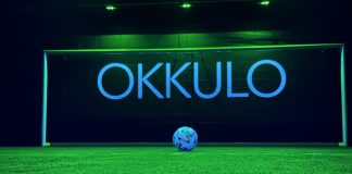 OKKULO: Shaping the future of sports training with light OKKULO sign in a football net.