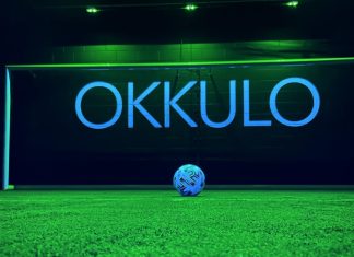 OKKULO: Shaping the future of sports training with light OKKULO sign in a football net.