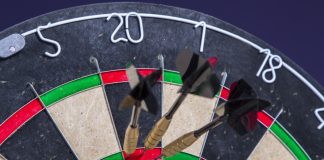 Sky confirms five-year extension with Professional Darts Corporation Darts scoring one hundred and eighty on a board.
