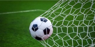 Second-tier Mexican club Apodaca suspends players amid betting investigation Football on goal with net background, football player shoot a leather foot ball for make a score, Peru.