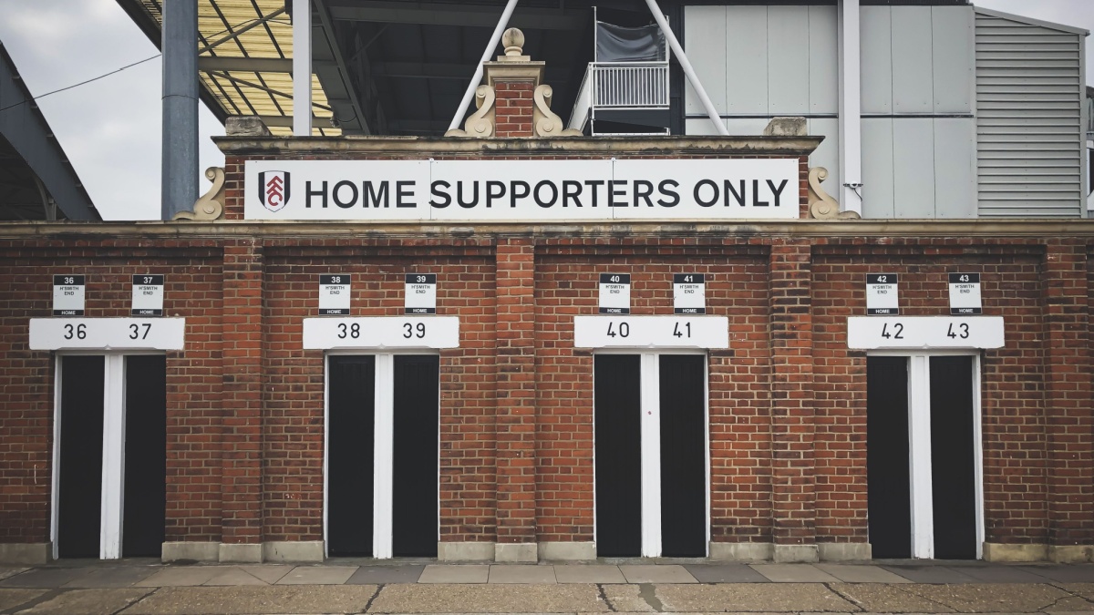 LONDON, ENGLAND - MARCH 1, 2019: View of the turnstiles entrance to Craven Cottage in London, England.