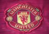 Manchester United signs record £20m Betway kit deal Warrington cheshire UK - may 21 2024: Manchester united logo on t-shirt.