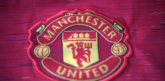 Warrington cheshire UK - may 21 2024: Manchester united logo on t-shirt.