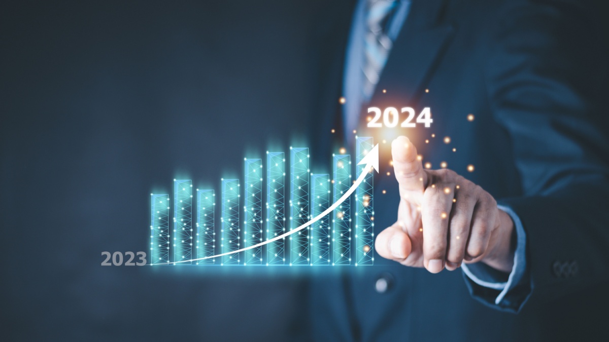 Column chart with company progress and growth by year, 2024, businessman calculates financial data for long term investments.