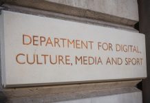 UK minister apologises after legal clash over football regulation LONDON- MAY, 2018: Department for Digital Culture Media and Sport- UK government department, external sign in Westminster.