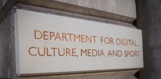 UK minister apologises after legal clash over football regulation LONDON- MAY, 2018: Department for Digital Culture Media and Sport- UK government department, external sign in Westminster.