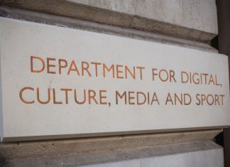 UK minister apologises after legal clash over football regulation LONDON- MAY, 2018: Department for Digital Culture Media and Sport- UK government department, external sign in Westminster.