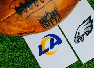 NFL reportedly set to go down under with matches in Melbourne PHILADELPHIA, JANUARY 14, 2025: Philadelphia Eagles vs. Los Angeles Rams, NFL Divisional Round. American football game for season 2024 - 2025. Football Ball on Green Grass and logos. NFL File photo.