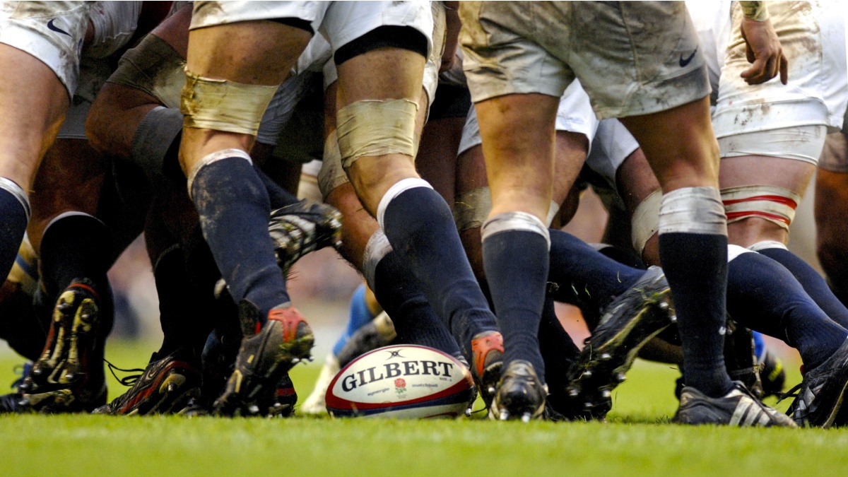 LONDON, ENGLAND-MARCH 26, 2007: Rugby players scrum during the Six Nations Tournament match England vs Italy.
