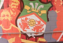 Wrexham AFC eyes international matches with new Kop stand Wrexham, Wales - 9th November 2024: A mural on a brick wall inside the Racecourse Ground, home stadium of Wrexham AFC in Wrexham, Wales, UK.