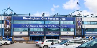 Tom Brady’s Birmingham City partner caught in licensing scandal BIRMINGHAM, ENGLAND - SEPTEMBER 17, 2019: Parked cars outside St Andrews Trillion Trophy Stadium in Birmingham, England.