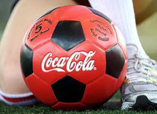 Premier League set to discuss Coca-Cola deal at shareholder meeting Coca Cola, potential partner of the Premier League, red ball, Welcome to the 2018 World Cup