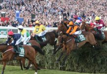 MPs gamble on Grand National to raise charity funds AINTREE RACECOURSE, LIVERPOOL, UK : 9 April 2022 : Noble Yeats ridden by Sam Waley-Cohen and trained by Emmet Mullins jump The Chair whilst winning the 2022 running of the Randox Grand National .