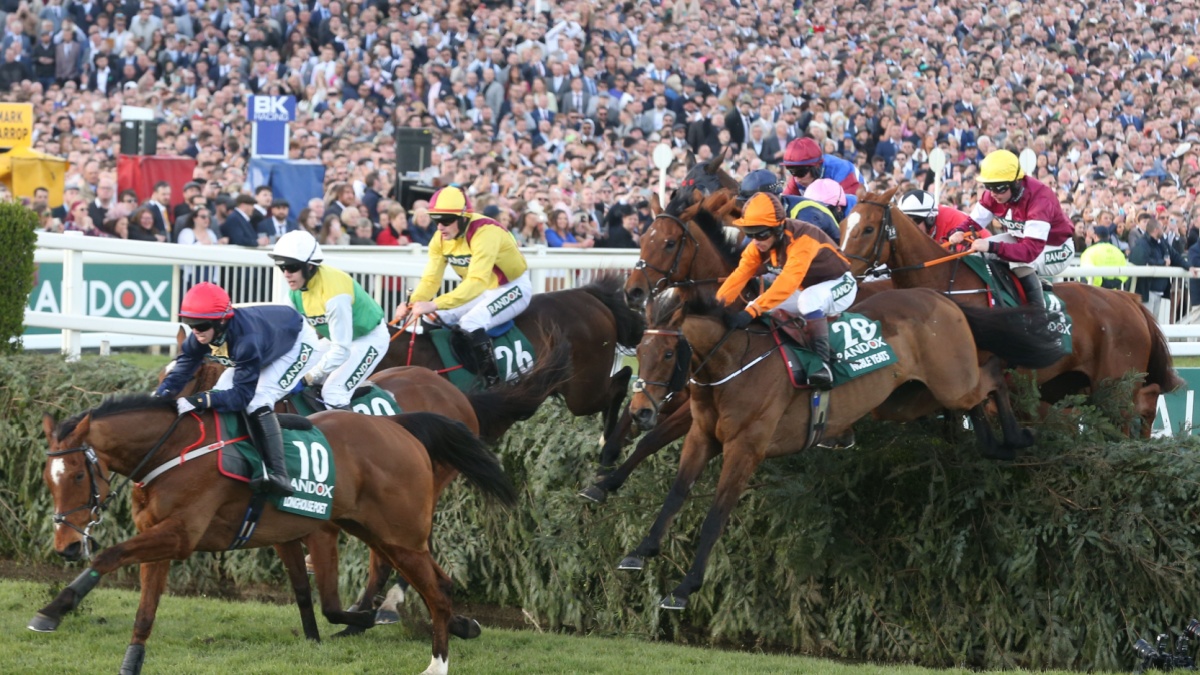 AINTREE RACECOURSE, LIVERPOOL, UK : 9 April 2022 : Noble Yeats ridden by Sam Waley-Cohen and trained by Emmet Mullins jump The Chair whilst winning the 2022 running of the Randox Grand National .