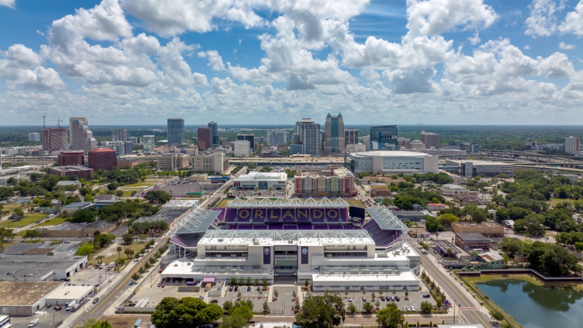 Aerial view of downtown Orlando, Florida with soccer stadium in the foreground.