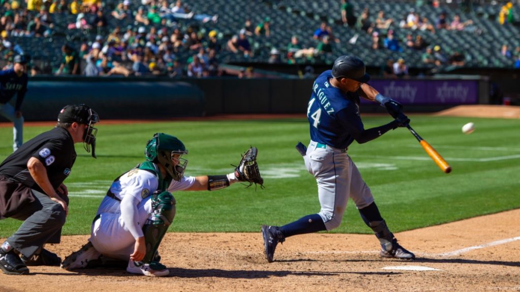 Seattle Mariners outfielder Julio Rodriguez hits against the Oakland Athletics at the Oakland Coliseum.