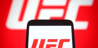 UFC’s Tom Aspinall to feature in casino marketing campaign with SPRIBE KYIV, UKRAINE - SEPTEMBER 29, 2021: In this photo illustration Ultimate Fighting Championship (UFC) logo is seen on a mobile phone and a computer screen.