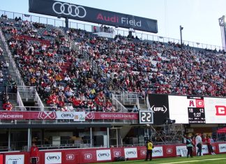 UFL sets sights on football innovation with new tech division Fans cheer the DC Defenders of the UFL at Audi Field in the United States capital city of Washington DC.