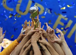 Women’s World Cup and La Liga show split in broadcast strategy Lyon, Rhone, France on July 7, 2019. FIFA Women's World Cup France 2019 - Final USA vs NED. Victory for Team USA, USA hands player with the Trophy.