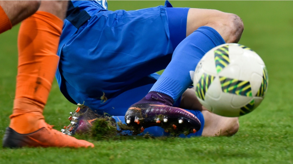 LUBIN, POLAND - DECEMBER 19, 2016: Match Polish Premier League Lotto Ekstraklasa between KGHM Zaglebie Lubin - Piast Gliwice 2:1. Player's legs.