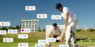 Authenticity is the new currency in sports communications Image of social media icons with growing numbers over caucasian male cricket players. Global social media, sports, communication and digital interface concept digitally generated image.