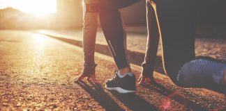 Enhanced Games founder open to debate “anytime, anywhere” Athlete woman in running start pose on the city street. Sport tight clothes. Bright sunset, blurry background. Horizontal