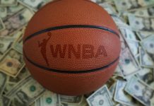 Betting firm signs first women’s sports franchise agreement An WNBA basketball on a pile of US dollars. Follows the announcement of BetMGM investing in the sport.