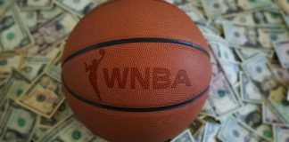 Betting firm signs first women’s sports franchise agreement An WNBA basketball on a pile of US dollars. Follows the announcement of BetMGM investing in the sport.