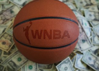 Betting firm signs first women’s sports franchise agreement An WNBA basketball on a pile of US dollars. Follows the announcement of BetMGM investing in the sport.