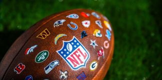 Has the NFL made a mistake shelving its diversity accelerator scheme? A photo of an American football with the NFL's team logos stitched