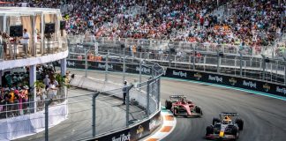 PwC’s F1 deal signals a broader shift in sport Two formula 1 cars racing during the 2023 Miami Grand Prix, two years before PwC and F1's partnership highlighted the importance of sports consulting