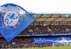 Boehly and Walter in talks over sale of Chelsea stake London, UK - March 10 2019: the view of Stamford bridge with big Chelsea flag during the match of Premier League between Chelsea - Wolverhampton Wanderers, Stamford Bridge stadium.