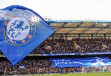 Boehly and Walter in talks over sale of Chelsea stake London, UK - March 10 2019: the view of Stamford bridge with big Chelsea flag during the match of Premier League between Chelsea - Wolverhampton Wanderers, Stamford Bridge stadium.