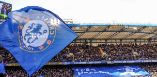 Boehly and Walter in talks over sale of Chelsea stake London, UK - March 10 2019: the view of Stamford bridge with big Chelsea flag during the match of Premier League between Chelsea - Wolverhampton Wanderers, Stamford Bridge stadium.