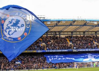 Boehly and Walter in talks over sale of Chelsea stake London, UK - March 10 2019: the view of Stamford bridge with big Chelsea flag during the match of Premier League between Chelsea - Wolverhampton Wanderers, Stamford Bridge stadium.