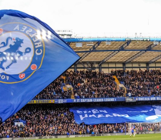 Boehly and Walter in talks over sale of Chelsea stake London, UK - March 10 2019: the view of Stamford bridge with big Chelsea flag during the match of Premier League between Chelsea - Wolverhampton Wanderers, Stamford Bridge stadium.