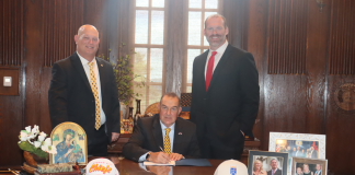 Public cash for Royals and Chiefs stirs backlash in Missouri Missouri Governor Kehoe with Kansas City Chiefs and Kansas City Royals Leaders