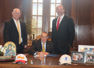 Public cash for Royals and Chiefs stirs backlash in Missouri Missouri Governor Kehoe with Kansas City Chiefs and Kansas City Royals Leaders