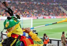 Women’s football is growing fast – far beyond Europe JOHANNESBURG - JULY 11 : Final at Soccer City Stadium: Spain vs. Netherlands on July 11, 2010 in Johannesburg. Spanish supporter with vuvuzela.