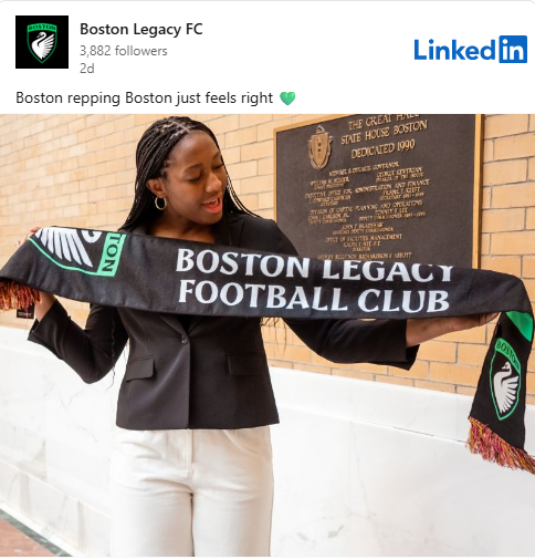 Aliyah Boston holding a scarf. 