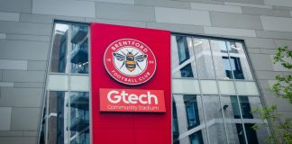 Meet Brentford FC’s new minority shareholders LONDON- JULY 31, 2023: Brentford FC football stadium exterior logo in West London.