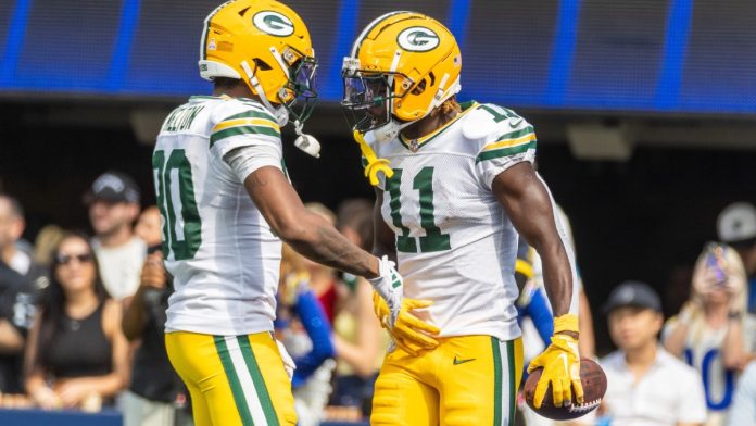 Green Bay Packers wide receivers Jayden Reed #11 celebrates with Bo Melton #80 after catching a touch down pass against the Los Angeles Rams in an NFL football game at SoFi Stadium, Oct. 6, 2024.