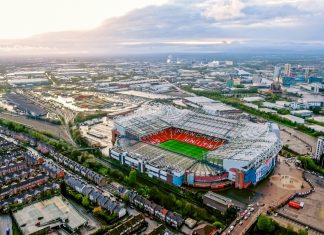 Manchester United’s ‘freight-sized’ pricing gap amid stadium rebuild UK, MANCHESTER - AUGUST 07, 2017: Old Trafford is a football stadium Greater Manchester England and the home of Manchester United. Aerial View of Iconic Football Ground.