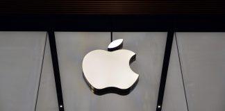 Apple rumour grows as Manchester United nears partner hat‑trick 11 April 2015 - Istanbul, Turkey: Apple Store logo. It is being suggested the company might partner with Manchester United.