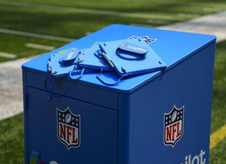 Why the NFL are putting Copilot AI on the sideline Image of Microsoft charging cart for Copilot use within the NFL