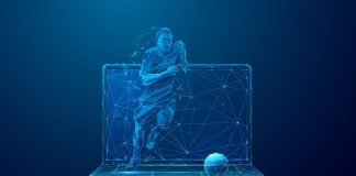 How European football is betting on data Genius Sports partnership with European leagues visualised by Abstract Soccer Player Runs Out of the Laptop Screen. Cyber sport or Sports Betting futuristic concept. Digital Football Player on Mobile Computer in Low Poly Wireframe Style on Dark Blue Background.