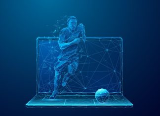 How European football is betting on data Genius Sports partnership with European leagues visualised by Abstract Soccer Player Runs Out of the Laptop Screen. Cyber sport or Sports Betting futuristic concept. Digital Football Player on Mobile Computer in Low Poly Wireframe Style on Dark Blue Background.